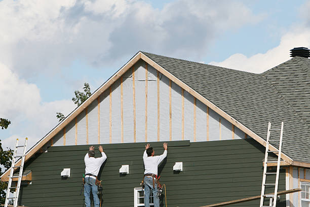Professional Siding Contractor technician working in Ellington, CT
